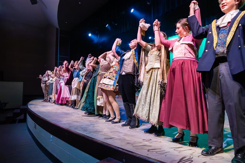 Students perform onstage